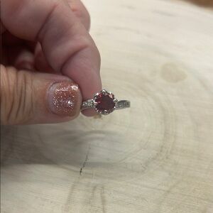 Radiant Silver Ring with Red Gemstone